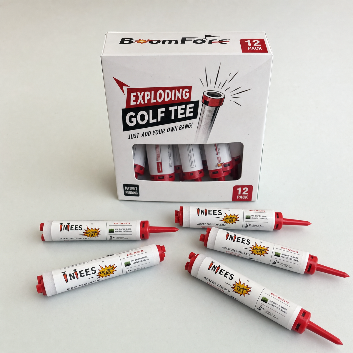 BoomFore exploding golf tee 12-pack box with tees